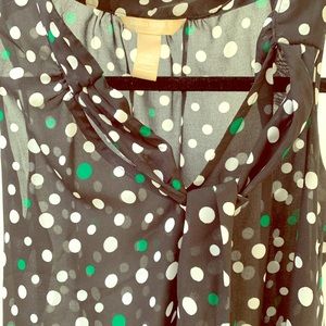 Green and white polka dot black blouse